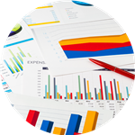 stacks of papers with charts and graphs